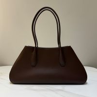 The Row Alger Shoulder Bag in Polished Saddle Leather Coffee