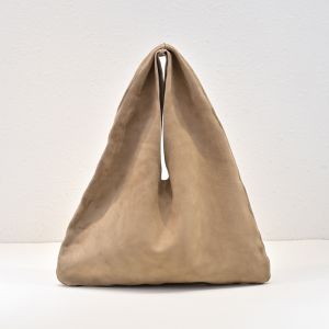 The Row Medium Bindle Bag in Soft Suede Nude